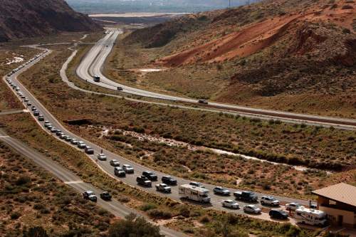Leah Hogsten | The Salt Lake Tribune

Vehicles waiting for entrance to Arches National Park in 2013.
