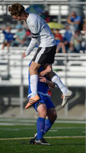 Francisco Kjolseth | The Salt Lake Tribune
Fremont's Brody Loftus, left, takes on a heavy load from Viewmont's Brayden Jewett in game action in Draper for the Class 5A boys' soccer championship.