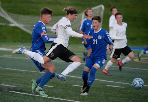 Francisco Kjolseth | The Salt Lake Tribune
Viewmont's Marshall Johnson #9, pushes past the Fremont defense in game action in Draper for the Class 5A boys' soccer championship.
