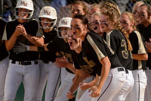 Trent Nelson  |  The Salt Lake Tribune
Maple Mountain players celebrate a home run by Maple Mountain's Mickie Mills (17) as Spanish Fork defeats Maple Mountain in the 4A high school softball championship game, Taylorsville, Thursday May 26, 2016.