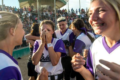Chris Detrick  |  The Salt Lake Tribune
Members of the Riverton softball team celebrate after winning the 5A championship game at Valley Regional Softball Complex Thursday May 26, 2016. Riverton defeated West 13-11.