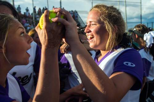 Chris Detrick  |  The Salt Lake Tribune
Members of the Riverton softball team celebrate after winning the 5A championship game at Valley Regional Softball Complex Thursday May 26, 2016. Riverton defeated West 13-11.