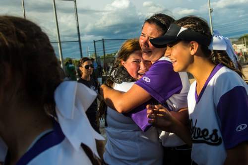Chris Detrick  |  The Salt Lake Tribune
Members of the Riverton softball team celebrate after winning the 5A championship game at Valley Regional Softball Complex Thursday May 26, 2016. Riverton defeated West 13-11.
