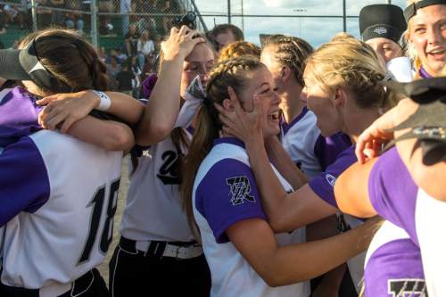 Chris Detrick  |  The Salt Lake Tribune
Members of the Riverton softball team celebrate after winning the 5A championship game at Valley Regional Softball Complex Thursday May 26, 2016. Riverton defeated West 13-11.