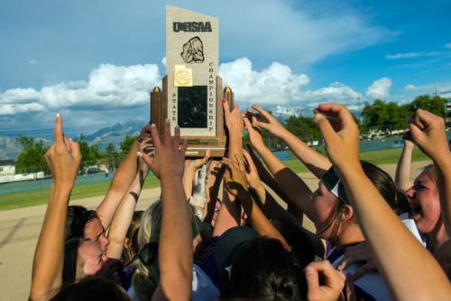 Chris Detrick  |  The Salt Lake Tribune
Members of the Riverton softball team celebrate after winning the 5A championship game at Valley Regional Softball Complex Thursday May 26, 2016. Riverton defeated West 13-11.