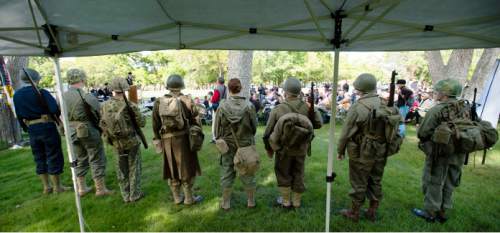 Steve Griffin  |  The Salt Lake Tribune
Uniforms from wars of the past are represented as Fort Douglas hosts its annual Memorial Day observance at its cemetery in Salt Lake City, Monday, May 25, 2015.