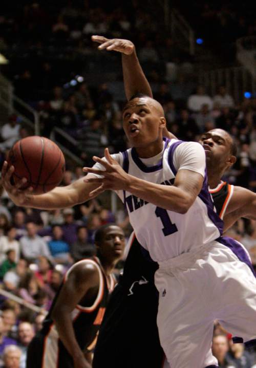 Weber's Damian Lillard drives past Idaho State forward Chron Tatum (25) during college men's basketball action Saturday, January 31, 2009 at the Dee Event Center on the Campus of Weber State University in Ogden. Jim Urquhart/The Salt Lake Tribune; 01/31/09