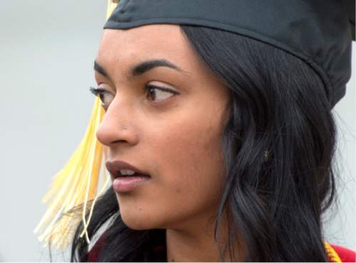 Rick Egan  |  The Salt Lake Tribune

Nisha Kavalam visits with University of Utah classmates as she prepares for her May graduation ceremony in the College of Social Work at Kingsbury Hall. Kavalam says administrators mishandled a sexual assault investigation after she reported being raped by a classmate.