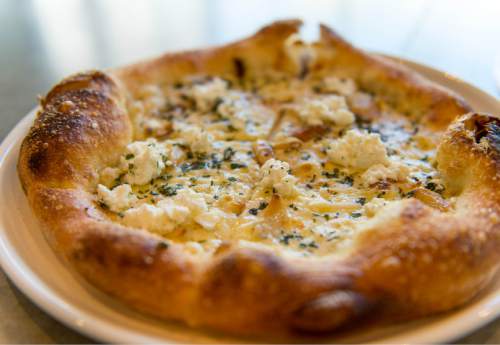 Trent Nelson  |  The Salt Lake Tribune
Several dining establishments have sprung up along Gallivan Avenue in downtown Salt Lake City, including From Scratch. Pictured, the white out pizza (alfredo sauce, roasted garlic, fresh ricotta cheese and parmesan reggiano and mozzarella).