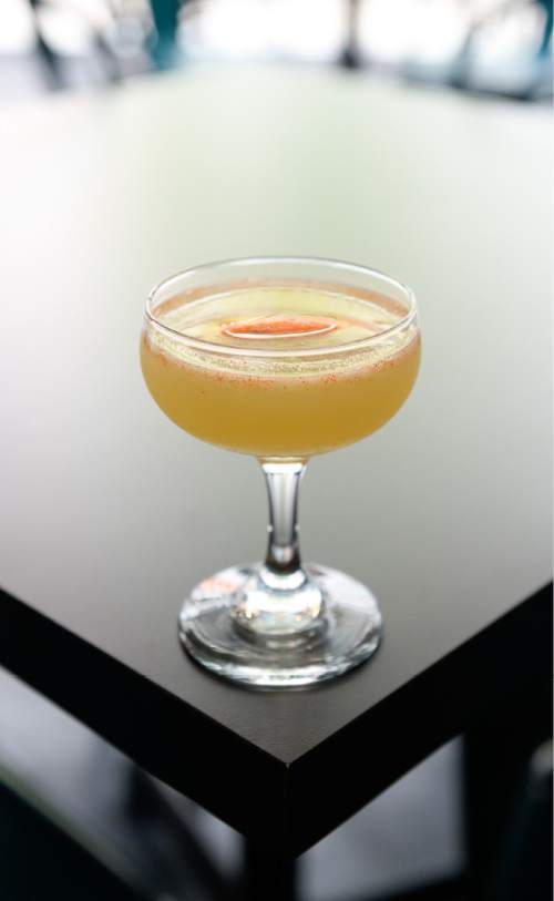 Francisco Kjolseth | The Salt Lake Tribune
Several new establishments have sprung up along Gallivan Avenue in downtown Salt Lake City, including Good Grammar Bar. Pictured, the Ru cocktail, containing tequila, dry vermouth, apricot brandy, plum brandy, cayenne, lemon and OJ.