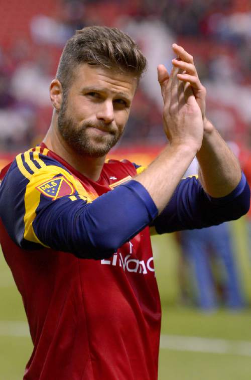 New York City FC defender Chris Wingert (17) walks around the stadium to cheering fans during an MLS soccer game against Real Salt Lake, Saturday, May 23, 2015, in Sandy, Utah. (Leah Hogsten/The Salt Lake Tribune via AP) DESERET NEWS OUT; LOCAL TELEVISION OUT; MAGS OUT