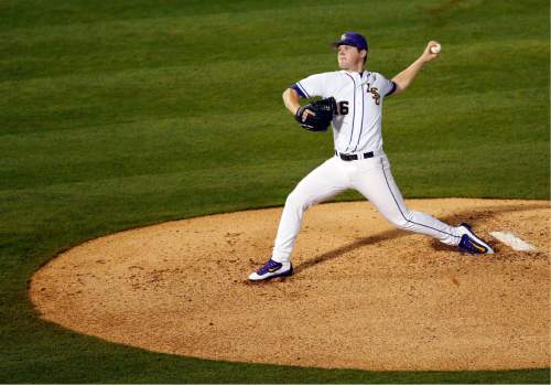LSU pitcher Jared Poche' delivers the ball against Mississippi State during the first inning of a Southeastern Conference NCAA college baseball tournament game at the Hoover Met, Thursday, May 26, 2016, in Hoover, Ala. (AP Photo/Brynn Anderson)