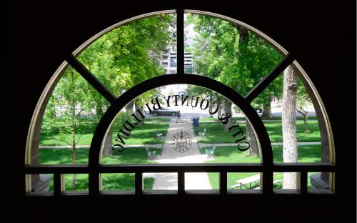 Scott Sommerdorf   |  The Salt Lake Tribune  
The view through one of the City-County Building's arched windows seen during a tour of the building, Thursday, May 26, 2016. City Hall is about to undergo a three-year renovation to repair stone work and do seismic upgrades. The first year will involve work on the tower and seismic improvements, followed by repairs on lower parts of the building in 2017 and 2018.