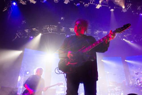 Rick Egan  |  The Salt Lake Tribune

Robert Smith plays guitar, as The Cure performs, at the Maverik Center, Friday, June 3, 2016.