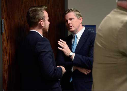 Scott Sommerdorf   |  The Salt Lake Tribune  
Utah gubernatorial candidate Jonathan Johnson, right, speaks with a party member as the Utah Republican Party Central Committee met in executive session, Saturday, June 4, 2016.