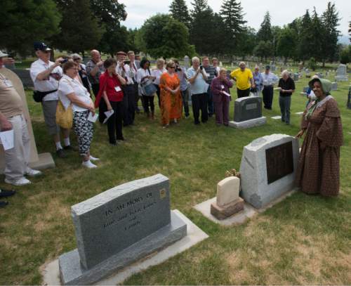Steve Griffin / The Salt Lake Tribune
Jerri Harwell depicts Jane Elizabeth Manning James as she tells her life story at the grave site of the historic African-American Mormon woman at the Salt Lake City Cemetery on Thursday, June 9, 2016. The event was part of a tour in conjunction with the Mormon History Association conference that visited significant sites and stories related to African-Americans in Utah history.