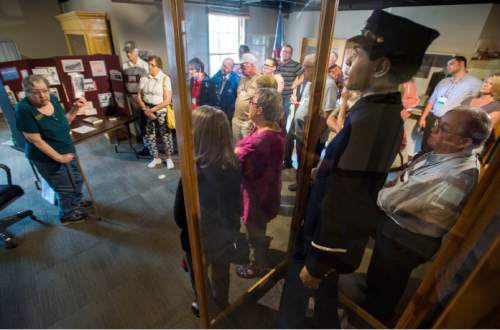 Steve Griffin / The Salt Lake Tribune
Tour members stand a replica of a member of the 24th Infantry at the  Fort Douglas Military Museum as they learn about African-Americans in Utah's history during a tour in conjunction with the Mormon History Association conference in Salt Lake City on Thursday, June 9, 2016. The 24th was an entirely African-American regiment  whose members were part of the famed Buffalo Soldiers.