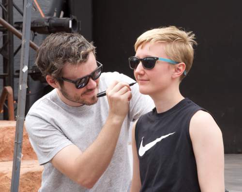 Lynn R. Johnson  |  Special to The Salt Lake Tribune


Em Grosland, who plays Peter Pan, is fitted for a microphone by audio technician Kyle Jamison during a May 20 rehearsal at the Tuacahn Amphitheater. "Peter Pan" opened May 27.