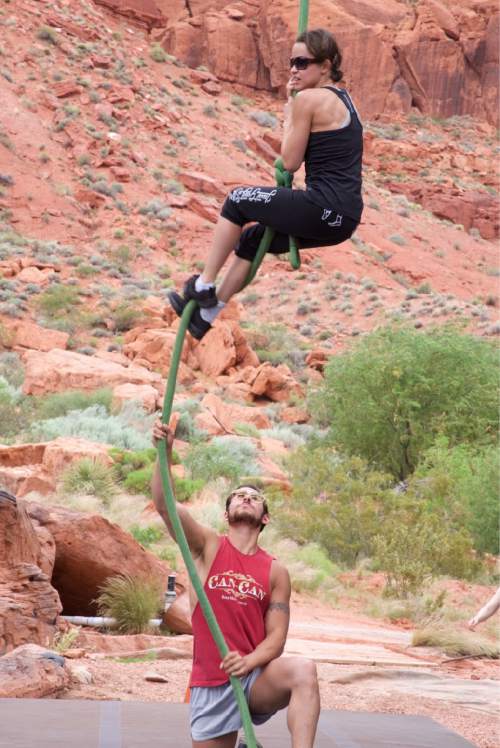 Lynn R. Johnson  |  Special to The Salt Lake Tribune


Against the backdrop of Tuacahn -- "The Canyon of the Gods" -- Mike Baerga and Daniela Veliz train for their role as "Vine Men" in the 2016 production of "Tarzan," opening June 3 at the Ivins, Utah amphitheater.