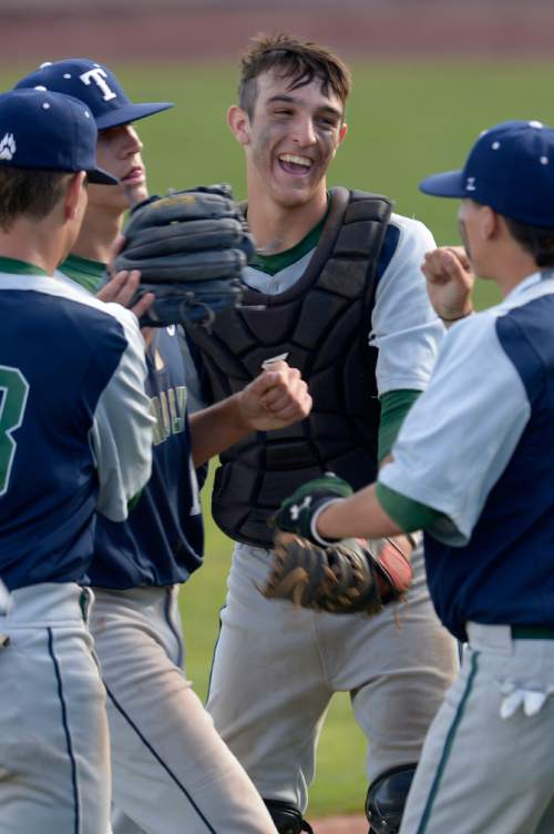 Leah Hogsten  |  The Salt Lake Tribune
Timpanogos' catcher Jake Brooksby celebrates the fourth inning shutout over Orem. Timpangos High School boys baseball team defeated the Orem Tigers 11-1 in 5 innings to win the 4A State Baseball Championship, May 27, 2016 at Utah Valley University's Brent Brown Ballpark.