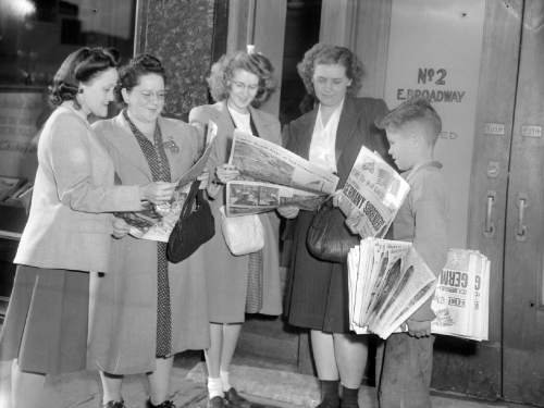 Women buy copies of The Salt Lake Tribune on VE Day, May 8, 1945. Courtesy Utah State Historical Society/Salt Lake Tribune collection