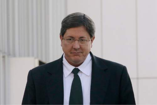 FILE - In this Jan. 21, 2015, file photo, high-ranking polygamous leader Lyle Jeffs leaves the federal courthouse, in Salt Lake City. Polygamous sect leader Jeffs is being let out of jail pending trial on accusations he helped orchestrate a multimillion-dollar food stamp fraud scheme. U.S. District Judge Ted Stewart in Salt Lake City on Thursday, June 9, 2016 granted Jeffs' latest request to be released, citing the fact that the other 10 defendants already out have complied with conditions set by the court. (AP Photo/Rick Bowmer, File)