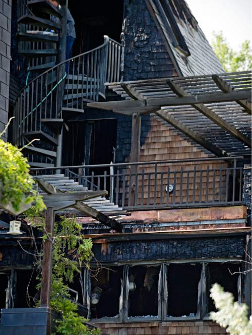 Lennie Mahler  |  The Salt Lake Tribune

People survey damage after a suspicious overnight house fire near the Capitol building took the life of John Williams, 72, a partner in Gastronomy, Inc., which owns restaurants in Salt Lake City.