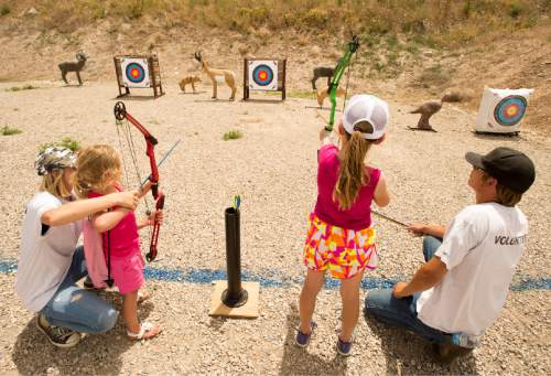 Rick Egan  |  The Salt Lake Tribune

Kids have fun with bows and arrows as part of Outdoor Adventure Days at the Lee Kay Public Shooting Range in Salt Lake City on Friday, June 10, 2016. The free event continues Saturday with fishing, kayaking and paddleboarding, and archery and firearms instruction.
