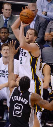 Steve Griffin  |  The Salt Lake Tribune


Utah Jazz forward Joe Ingles (2) fires a three over San Antonio Spurs forward Kawhi Leonard (2) during the Jazz versus Spurs NBA basketball game at Vivint Smart Home Arena in Salt Lake City, Tuesday, April 5, 2016.