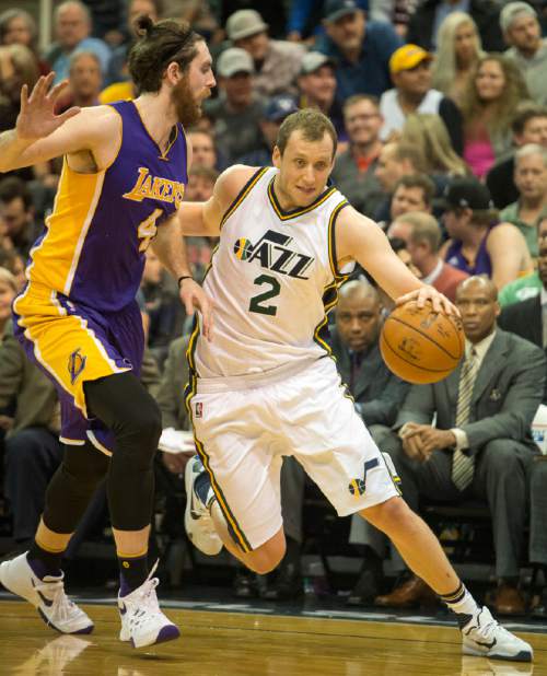 Rick Egan  |  The Salt Lake Tribune

Utah Jazz forward Joe Ingles (2) gets by Los Angeles Lakers forward Ryan Kelly (4), in NBA action, The Utah Jazz vs. The Los Angeles Lakers, in Salt Lake City, Saturday, January 16, 2016.