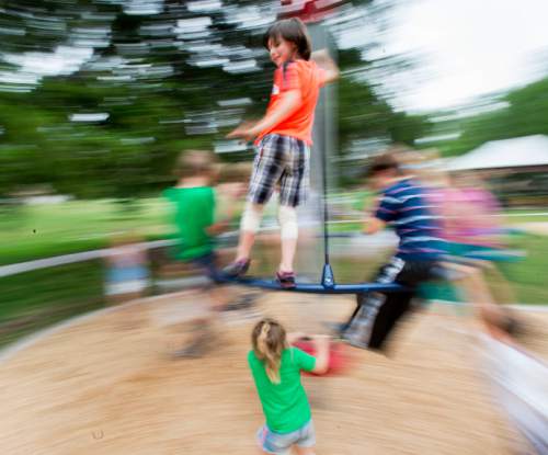 Steve Griffin  |  The Salt Lake Tribune

Children play on the new playground equipment as the Salt Lake City's Public Services Department and the Parks and Public Lands Division open the new Fairmont Park playground Friday, June 10, 2016.