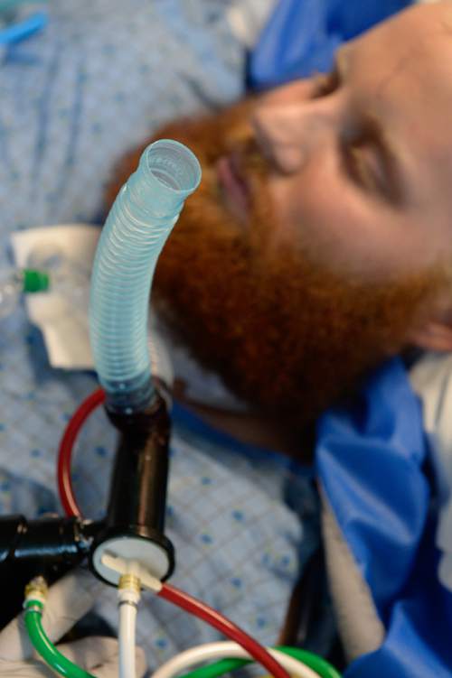 Francisco Kjolseth | The Salt Lake Tribune
USU defensive lineman Brady Holt who was badly injured in a May car crash, undergoes breathing therapy treatment at Intermountain Medical Center in Murray.