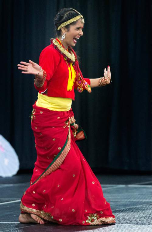 Rick Egan  |  The Salt Lake Tribune

Aashima Acharya performs with the Nepalese dance group at the Utah Asian Festival, at the South Towne Exposition Center, Saturday, June 11, 2016.