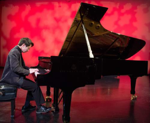 Rick Egan  |  The Salt Lake Tribune

John Zhao,14, of Midvale, is one of  four young artists who study in Utah competing in The Gina Bachauer International Piano Foundation competition this year.
