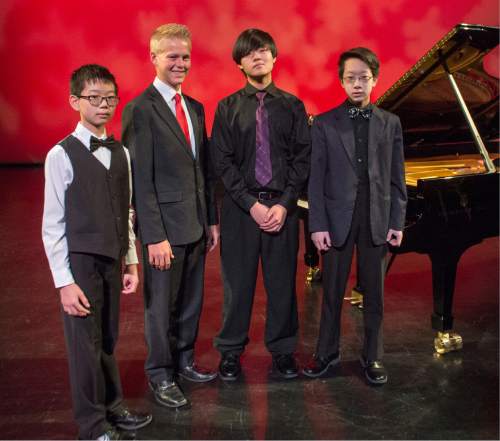 Rick Egan  |  The Salt Lake Tribune

Richard Sheng, 12, Joseph Buck, 17, Junhao "Austin" Wang 15, and John Zhao,14, are the four young artists who study in Utah competing in The Gina Bachauer International Piano Foundation competition this year.