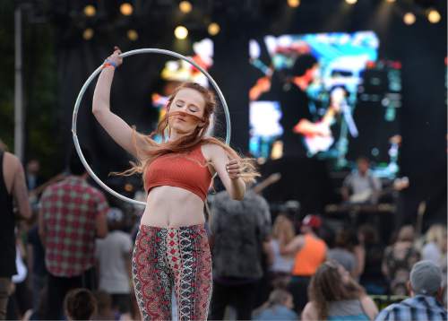 Scott Sommerdorf   |  The Salt Lake Tribune  
Heather Richey dances with a hula hoop near the Bonanza Stage at Bonanza Campout at Rivers Edge Resort  on Friday, June 8,  in Heber. The inaugural two-day music and camping festival featured more than 30 live performances on two stages.