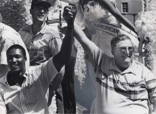 |  Tribune File Photo

Karl Malone  and Frank Layden ride in the July 24 1985  Pioneer Day parade.