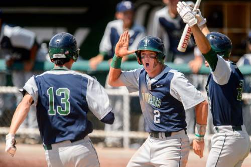 Trent Nelson  |  The Salt Lake Tribune
Timpanogos's Conner Halford (13) and Timpanogos's Tanner Evans (2) celebrate a score as Orem faces Timpanogos in the 4A state high school baseball championship, in Orem, Friday May 27, 2016.