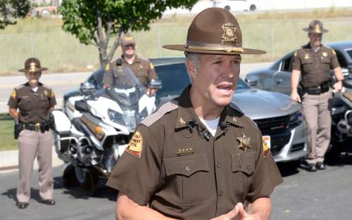 Al Hartmann  |  The Salt Lake Tribune 
Utah Highway Patrol Col. Daniel Furh speaks at a news conference in Murray on Tuesday about a campaign to address the spike in fatalities and aggressive driving in particular. The UHP will be pulling out all the stops using a patrol surge, including unmarked ìinterceptorî cruisers, and motorcycles to get people to slow down.
