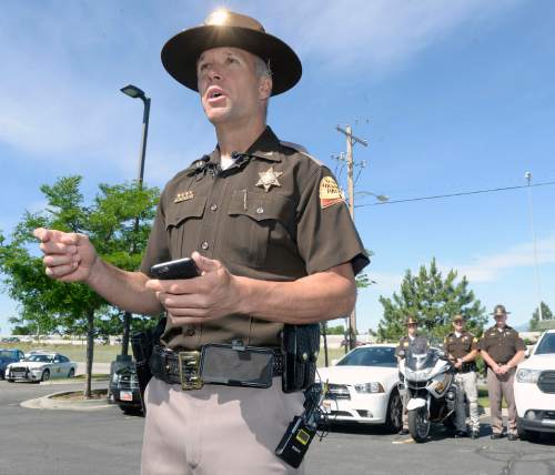 Al Hartmann  |  The Salt Lake Tribune 
Utah Highway Patrol Col. Daniel Furh speaks at a news conference in Murray Tuesday June 14 on a disastrous "100 Deadliest Days" campaign thus far this year, addressing the spike in fatalities and aggressive driving in particular.   The UHP will be pulling out all the stops using a patrol surge, including unmarked "interceptor" cruisers, and motorcycles to get people to slow down.