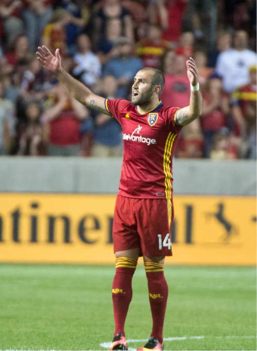 Rick Egan  |  The Salt Lake Tribune

Real Salt Lake forward Yura Movsisyan (14) tries to get the crowd involved in the game, after scoring a goal, in MLS soccer action, Real Salt Lake vs. Portland Timbers, in Sandy, Friday, June 18, 2016.
