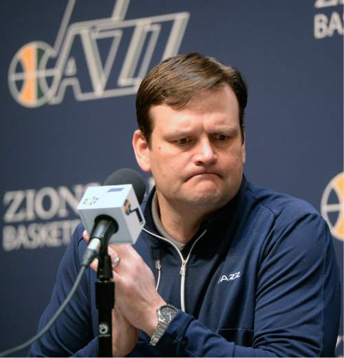Al Hartmann  |  The Salt Lake Tribune 
Jazz General Manager Dennis Lindsey ponders a reporter's question during the last media availability of the season at the team's practice facility in Salt Lake City Thursday April 16, 2015.  Players cleaned out their lockers Thursday after Wednesday night's loss to the Houston Rockets to finish with a 38-44 record for the season.
