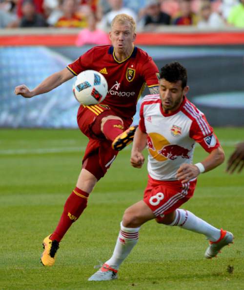Steve Griffin / The Salt Lake Tribune

Real Salt Lake defender Justen Glad (15) advances the ball as New York Red Bulls midfielder Felipe Martins (8) tries to cut hime off during their game at Rio Tinto Stadium in Sandy Wednesday June 22, 2016.