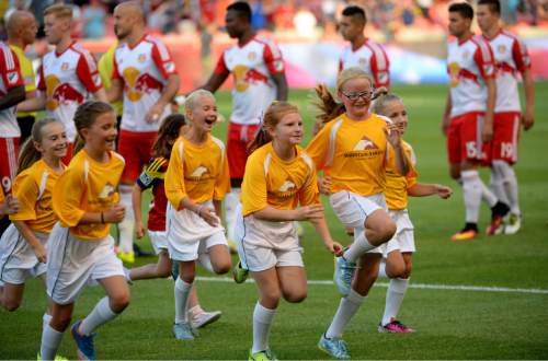 Steve Griffin / The Salt Lake Tribune

Youngsters run off the field prior to the start of the RSL vs. New York Red Bulls soccer game at Rio Tinto Stadium in Sandy Wednesday June 22, 2016.