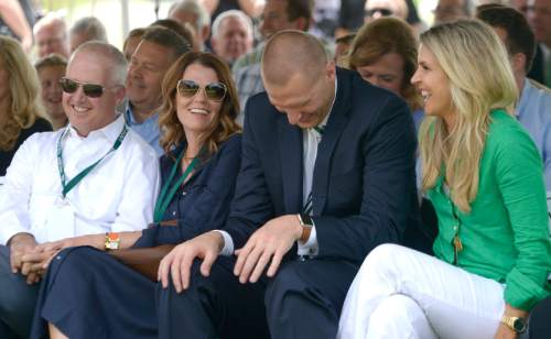 Leah Hogsten  |  The Salt Lake Tribune
l-r  NUVI executive chair, Keith Nellesen and wife Melissa Nellesen laugh with UVU men's basketball coach Mark Pope and wife Lee Anne as UVU president Matthew Holland makes jokes at Pope's expense.  Utah Valley University celebrated the construction of a new $3.5 million NUVI Basketball Center,a conditioning facility for men's and women's basketball teams during a groundbreaking ceremony for Wednesday, June 22, 2016, on the south side of the UCCU Center.