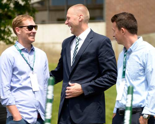 Leah Hogsten  |  The Salt Lake Tribune
l-r Former UVU basketball and NBA player Travis Hansen shares a laugh with UVU men's basketball head coach Mark Pope and former UVU basketball player Ryan Toolson. Utah Valley University celebrated the construction of a new $3.5 million NUVI Basketball Center,a conditioning facility for men's and women's basketball teams during a groundbreaking ceremony for Wednesday, June 22, 2016, on the south side of the UCCU Center.