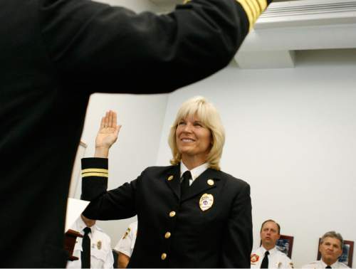 Francisco Kjolseth | Tribune file photo

Martha Ellis is sworn in after being promoted to the rank of Division Chief for Salt Lake, becoming the Salt Lake City Fire Department's first female fire marshall in the Salt Lake Valley on May 7, 2009.
Ellis has filed a notice of claim, alleging fraud, fire code violations and cover-ups at SLC Fire Department.
