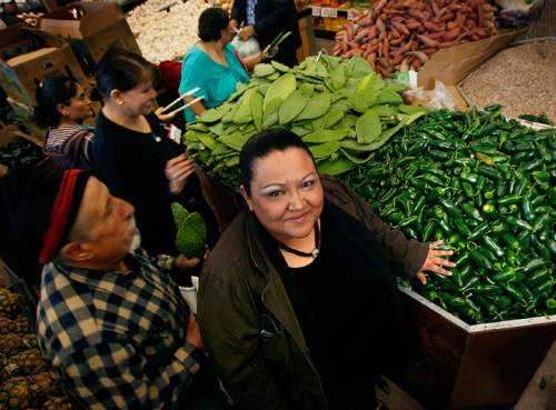 Scott Sommerdorf  |  Tribune file photo

Rhosby Barker, director of Casa Chiapas, stands in the produce section of the Latino Mall on Redwood Road, Thursday, March 31, 2011. The market carries many items - like these noplaes and jalapenos, that cater to the growing Latino community. The Latino population in West Valley has increased by 33.1% in the past year.