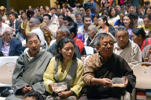 Al Hartmann  |  The Salt Lake Tribune 
Members and friends gather at the Tibetan Utah Community Center in Salt Lake City Wednesday June 22 where the Dalai Lama will be speaking.
