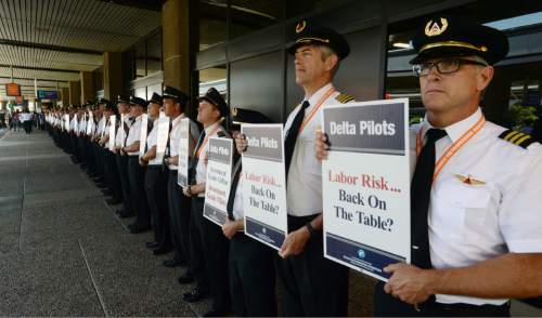 Steve Griffin / The Salt Lake Tribune

About 100 Delta Airlines pilots participate in a national picket to protest salaries at the Salt Lake City International Airport, Friday June 24, 2016.